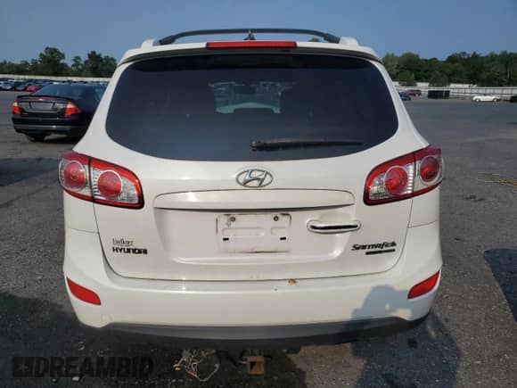 2011 Hyundai Santa Fe Limited с VIN 5XYZKDAG5BG079893, выставлен на аукционе Copart как лот 68065195 с пробегом 233 285 миль миль и Списание • Salvage title. История ставок и продаж доступна на DreamBid. Изображение 6.