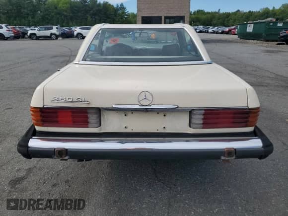 1985 Mercedes-Benz 380 with VIN WDBBA45C6FA024594, listed as a Copart auction lot 57436025 with 86,663 mi miles and Salvage title. Bid and sale history available at DreamBid. Image 6.