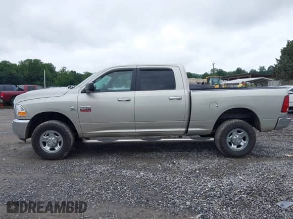 2010 Dodge 2500 Laramie with VIN 3D7UT2CL0AG181047, listed as a IAAI auction lot 42919372 with 158,914 mi miles and . Bid and sale history available at DreamBid. Image 14.
