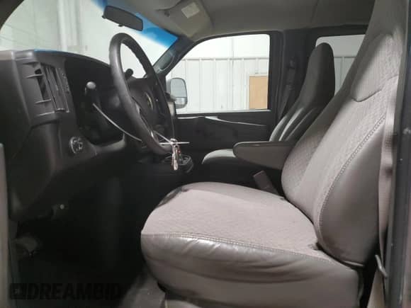 2009 Chevrolet Express Passenger с VIN 1GAGG25K691140635, выставлен на аукционе Copart как лот 88503195 с пробегом 144 026 миль миль и Списание • Salvage title. История ставок и продаж доступна на DreamBid. Изображение 7.