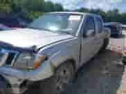 2009 Nissan Frontier SE with VIN 1N6AD07U79C420767, listed as a IAAI auction lot 42995943 with 221,270 mi miles and . Bid and sale history available at DreamBid. Image 2.