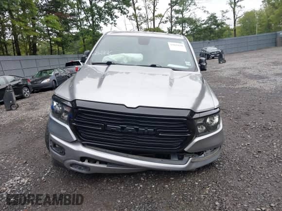 2021 Ram 1500 Big Horn with VIN 1C6SRFFT4MN591114, listed as a IAAI auction lot 43043650 with 146,319 mi miles and . Bid and sale history available at DreamBid. Image 12.