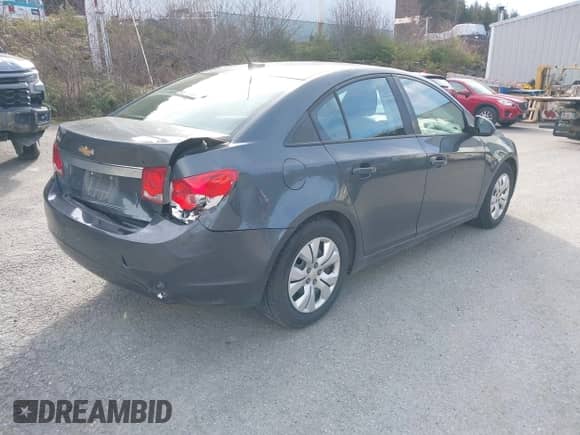2013 Chevrolet Cruze LS with VIN 1G1PB5SHXD7228747, listed as a IAAI auction lot 41895930 with 100,405 mi miles and . Bid and sale history available at DreamBid. Image 4.
