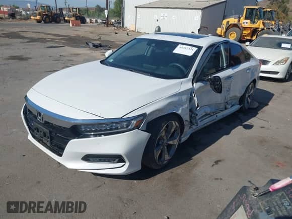 2018 Honda Accord Touring with VIN 1HGCV1F95JA146448, listed as a IAAI auction lot 43237331 with 28,446 mi miles and . Bid and sale history available at DreamBid. Image 19.