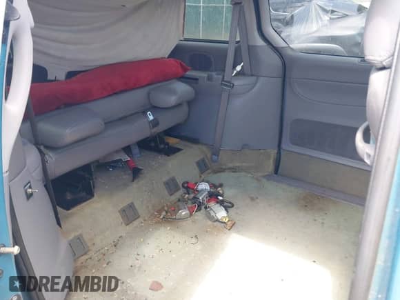 1996 Dodge Grand Caravan with VIN 1B4GP54R8TB458827, listed as a IAAI auction lot 42074872 with 97,566 mi miles and . Bid and sale history available at DreamBid. Image 8.