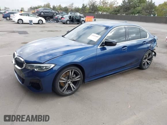 2021 BMW 3 Series 330i с VIN 3MW5R1J09M8B86677, выставлен на аукционе IAAI как лот 43432487 с пробегом 74 515 миль миль и . История ставок и продаж доступна на DreamBid. Изображение 2.