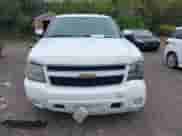 2010 Chevrolet Suburban LT with VIN 1GNUKJE32AR113764, listed as a IAAI auction lot 43277102 with 297,432 mi miles and . Bid and sale history available at DreamBid. Image 12.