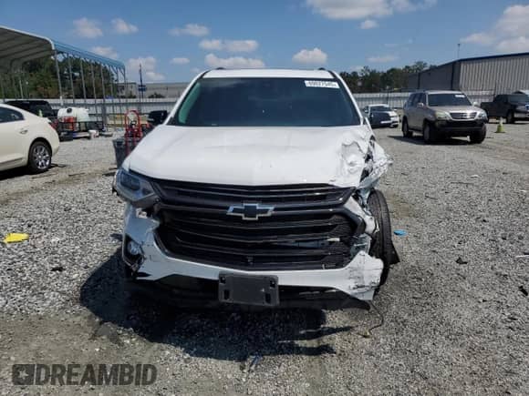 2020 Chevrolet Traverse Premier с VIN 1GNEVKKW5LJ302054, выставлен на аукционе Copart как лот 69027545 с пробегом 59 165 миль миль и Списание • Salvage title. История ставок и продаж доступна на DreamBid. Изображение 5.