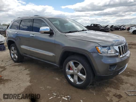 2012 Jeep Grand Cherokee Limited z VIN 1C4RJFBG5CC102608, wystawiony jako Copart lot #70375545 z przebiegiem 103 079 mil mil oraz Szkoda całkowita • Salvage title. Historia ofert i sprzedaży dostępna na DreamBid. Obrazek 4.