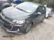2017 Chevrolet Sonic LT z VIN 1G1JD6SH9H4144741, wystawiony jako IAAI lot #42732148 z przebiegiem 142 736 mil mil oraz . Historia ofert i sprzedaży dostępna na DreamBid. Obrazek 2.
