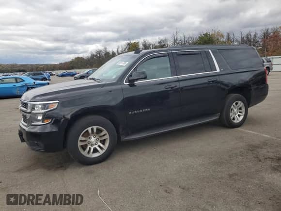 2016 Chevrolet Suburban LT with VIN 1GNSKHKC8GR405917, listed as a Copart auction lot 82617755 with 328,636 mi miles and Clean title. Bid and sale history available at DreamBid. Image 1.