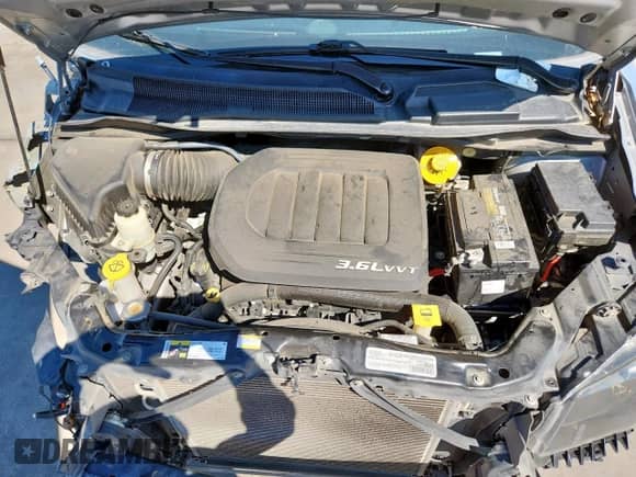 2017 Dodge Grand Caravan SE z VIN 2C4RDGBG0HR550184, wystawiony jako Copart lot #81712195 z przebiegiem 89 256 mil mil oraz Szkoda całkowita • Salvage title. Historia ofert i sprzedaży dostępna na DreamBid. Obrazek 12.