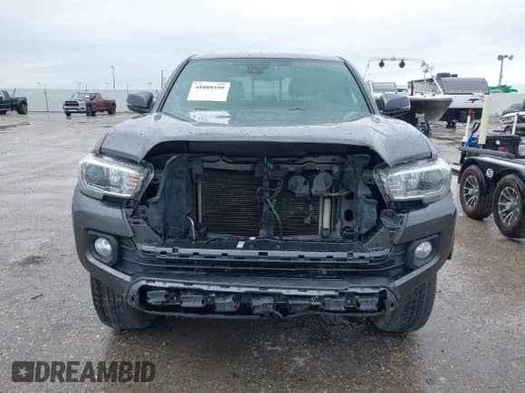 2021 Toyota Tacoma SR5 с VIN 5TFAZ5CNXMX097509, выставлен на аукционе IAAI как лот 41889399 с пробегом 81 598 миль миль и . История ставок и продаж доступна на DreamBid. Изображение 6.