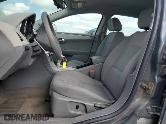 2009 Chevrolet Malibu 1LS with VIN 1G1ZG57B19F134381, listed as a Copart auction lot 67913345 with 68,757 mi miles and Salvage title. Bid and sale history available at DreamBid. Image 7.