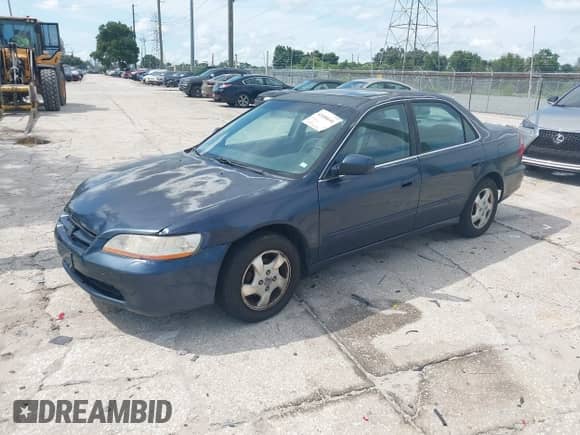 1999 Honda Accord EX with VIN 1HGCG5651XA151119, listed as a IAAI auction lot 42688646 with 102,895 mi miles and . Bid and sale history available at DreamBid. Image 2.
