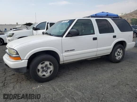 2004 Chevrolet Blazer LS z VIN 1GNDT13X04K152269, wystawiony jako Copart lot #62951164 z przebiegiem 136 859 mil mil oraz Czysty tytuł • Clean title. Historia ofert i sprzedaży dostępna na DreamBid. Obrazek 1.