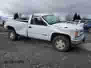 1997 GMC Sierra 1500 with VIN 1GTEK14W5VZ551810, listed as a Copart auction lot 47287015 with 168,113 mi miles and Salvage title. Bid and sale history available at DreamBid. Image 4.