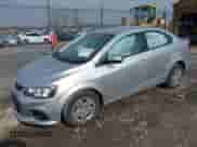 2018 Chevrolet Sonic LS with VIN 1G1JB5SHXJ4110653, listed as a IAAI auction lot 38803048 with 64,231 mi miles and . Bid and sale history available at DreamBid. Image 2.