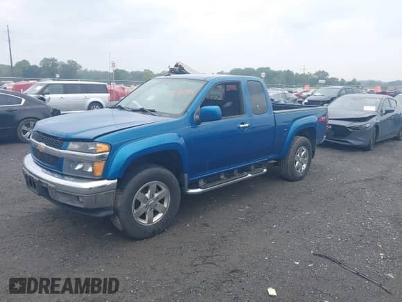 2012 Chevrolet Colorado 2LT z VIN 1GCJSDFE4C8148246, wystawiony jako IAAI lot #43289854 z przebiegiem 178 696 mil mil oraz . Historia ofert i sprzedaży dostępna na DreamBid. Obrazek 2.