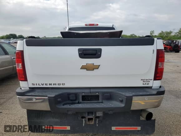 2011 Chevrolet Silverado 1500 с VIN 1GC4C1C83BF113571, выставлен на аукционе Copart как лот 58691455 с пробегом 494 553 миль миль и Списание • Salvage title. История ставок и продаж доступна на DreamBid. Изображение 6.
