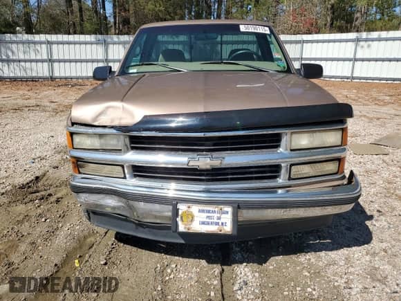 1997 Chevrolet Silverado 1500 with VIN 1GCEC14R4VZ211975, listed as a Copart auction lot 50190115 with 132,978 mi miles and Salvage title. Bid and sale history available at DreamBid. Image 5.