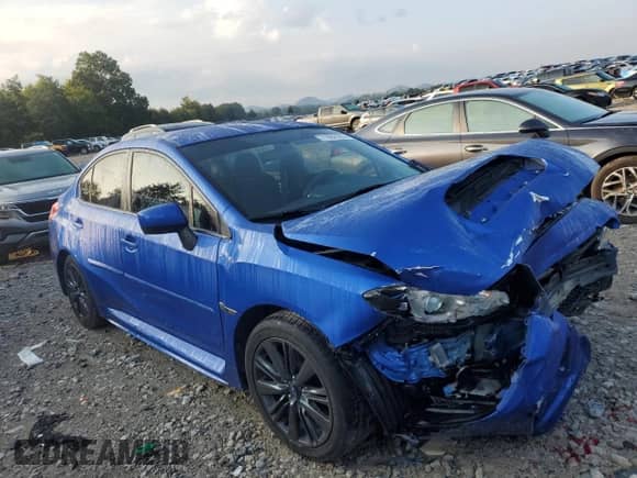 2016 Subaru WRX with VIN JF1VA1B65G9810844, listed as a Copart auction lot 71692305 with 74,132 mi miles and Salvage title. Bid and sale history available at DreamBid. Image 4.