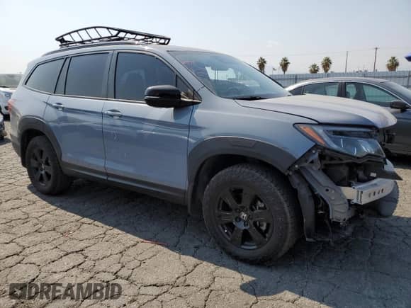 2022 Honda Pilot TrailSport с VIN 5FNYF6H84NB048673, выставлен на аукционе Copart как лот 64606855 с пробегом 136 616 миль миль и Списание • Salvage title. История ставок и продаж доступна на DreamBid. Изображение 4.