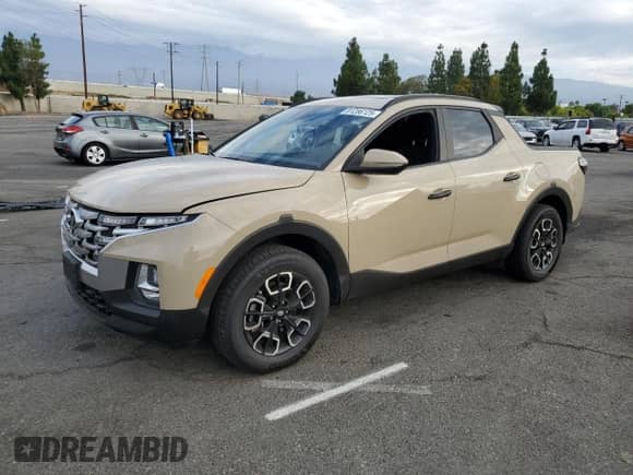 2023 Hyundai Santa Cruz SEL z VIN 5NTJCDAE5PH073098, wystawiony jako Copart lot #81286125 z przebiegiem 57 432 mil mil oraz Szkoda całkowita • Salvage title. Historia ofert i sprzedaży dostępna na DreamBid. Obrazek 1.