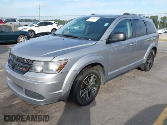 2017 Dodge Journey SE z VIN 3C4PDCAB9HT636922, wystawiony jako IAAI lot #43398742 z przebiegiem 179 646 mil mil oraz . Historia ofert i sprzedaży dostępna na DreamBid. Obrazek 17.