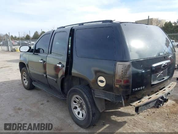 2007 Chevrolet Tahoe LS with VIN 1GNFC13C17R323757, listed as a IAAI auction lot 42196147 with Not provided miles and . Bid and sale history available at DreamBid. Image 3.