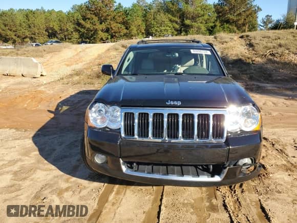 2009 Jeep Grand Cherokee with VIN 1J8HR68T19C550936, listed as a Copart auction lot 80090724 with 113,543 mi miles and Salvage title. Bid and sale history available at DreamBid. Image 5.