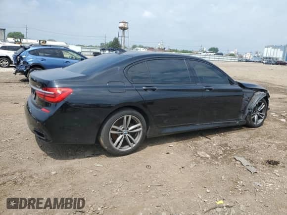 2016 BMW 7 Series 750i xDrive with VIN WBA7F2C5XGG417558, listed as a Copart auction lot 65567865 with 94,441 mi miles and Salvage title. Bid and sale history available at DreamBid. Image 3.