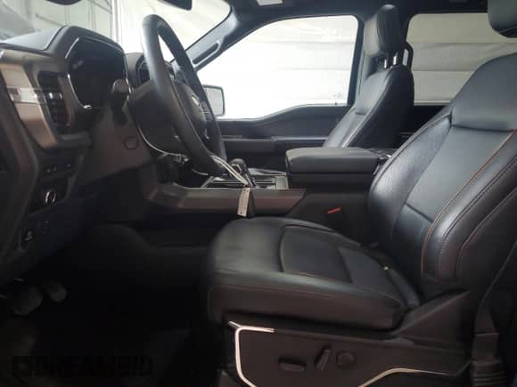 2024 Ford F-150 Lariat with VIN 1FTFW5L83RKE25818, listed as a Copart auction lot 64980445 with 13,717 mi miles and Salvage title. Bid and sale history available at DreamBid. Image 7.