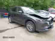 2025 Mazda CX-5 S Select z VIN JM3KFBBL6S0621120, wystawiony jako IAAI lot #42927385 z przebiegiem 13 538 mil mil oraz . Historia ofert i sprzedaży dostępna na DreamBid. Obrazek 1.