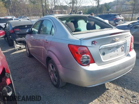 2013 Chevrolet Sonic LTZ with VIN 1G1JE5SG0D4113306, listed as a IAAI auction lot 41897356 with 135,291 mi miles and . Bid and sale history available at DreamBid. Image 3.