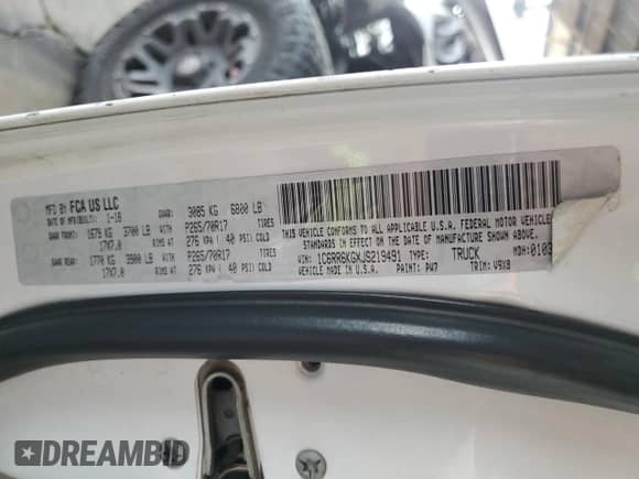 2018 Ram 1500 Tradesman z VIN 1C6RR6KGXJS219491, wystawiony jako Copart lot #52093895 z przebiegiem 212 925 mil mil oraz Szkoda całkowita • Salvage title. Historia ofert i sprzedaży dostępna na DreamBid. Obrazek 12.