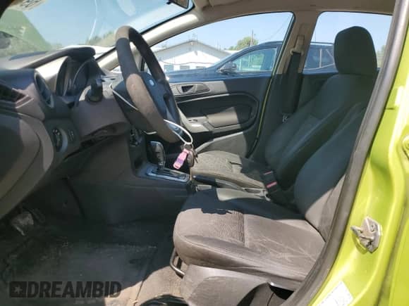 2012 Ford Fiesta SE with VIN 3FADP4BJ9CM112085, listed as a Copart auction lot 69342315 with 143,753 mi miles and Salvage title. Bid and sale history available at DreamBid. Image 7.