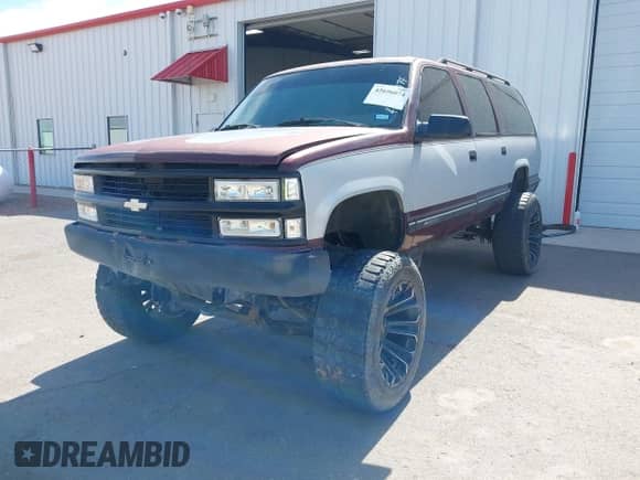 1994 Chevrolet Suburban with VIN 1GNFK16K2RJ325458, listed as a IAAI auction lot 42656074 with 244,166 mi miles and . Bid and sale history available at DreamBid. Image 2.