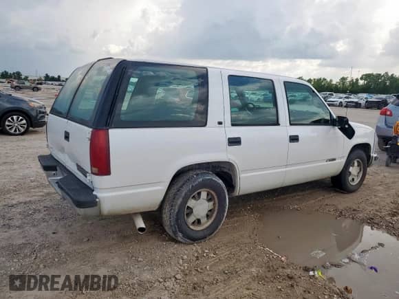1999 Chevrolet Tahoe Police Special z VIN 1GNEC13RXXR152653, wystawiony jako Copart lot #68429955 z przebiegiem 197 346 mil mil oraz Szkoda całkowita • Salvage title. Historia ofert i sprzedaży dostępna na DreamBid. Obrazek 3.