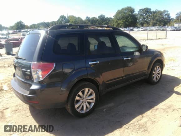 2013 Subaru Forester X Premium z VIN JF2SHADC9DH401440, wystawiony jako IAAI lot #43381836 z przebiegiem 178 590 mil mil oraz . Historia ofert i sprzedaży dostępna na DreamBid. Obrazek 4.