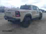 2022 Ram 1500 TRX with VIN 1C6SRFU95NN399791, listed as a IAAI auction lot 42040767 with 38,816 mi miles and . Bid and sale history available at DreamBid. Image 4.