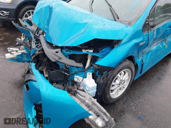 2018 Toyota Prius Plus z VIN JTDKARFP7J3070223, wystawiony jako IAAI lot #42922283 z przebiegiem 65 134 mil mil oraz . Historia ofert i sprzedaży dostępna na DreamBid. Obrazek 18.