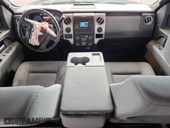 2014 Ford F-150 XLT с VIN 1FTFW1ET7EFC19866, выставлен на аукционе Copart как лот 83981615 с пробегом 134 864 миль миль и Списание • Salvage title. История ставок и продаж доступна на DreamBid. Изображение 8.