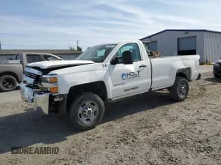2018 Chevrolet Silverado 2500HD Work Truck z VIN 1GC0CUEGXJZ236124, wystawiony jako Copart lot #61263735 z przebiegiem 141 519 mil mil oraz Szkoda całkowita • Salvage title. Historia ofert i sprzedaży dostępna na DreamBid. Obrazek 1.