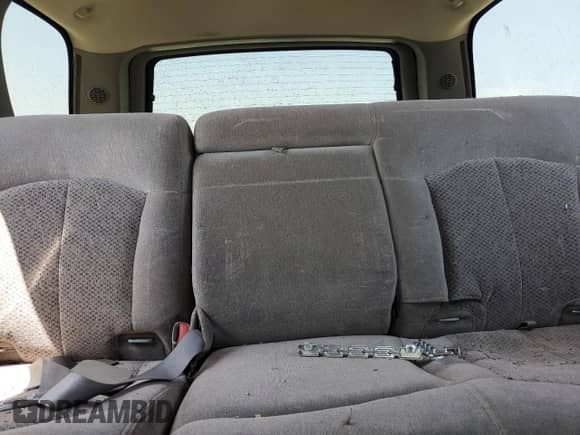 2002 Chevrolet Tahoe LS z VIN 1GNEC13V62R148217, wystawiony jako Copart lot #58536635 z przebiegiem Nie podano mil oraz Czysty tytuł • Clean title. Historia ofert i sprzedaży dostępna na DreamBid. Obrazek 10.