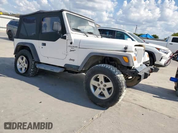 2001 Jeep Wrangler Sport с VIN 1J4FA49S01P305620, выставлен на аукционе Copart как лот 85516025 с пробегом Не указан миль и Списание • Salvage title. История ставок и продаж доступна на DreamBid. Изображение 4.
