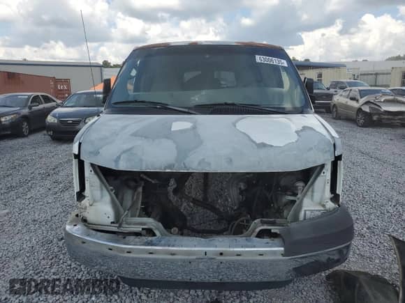 2004 Chevrolet Express Passenger z VIN 1GAHG39U141135891, wystawiony jako Copart lot #63006135 z przebiegiem Nie podano mil oraz Szkoda całkowita • Salvage title. Historia ofert i sprzedaży dostępna na DreamBid. Obrazek 5.