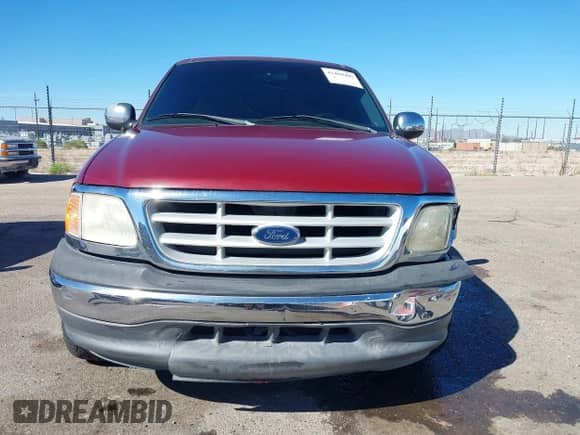 1999 Ford F-150 with VIN 1FTRX17W3XKB03527, listed as a IAAI auction lot 43450405 with 121,752 mi miles and . Bid and sale history available at DreamBid. Image 12.
