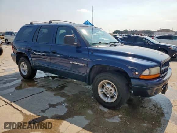 2000 Dodge Durango с VIN 1B4HR28Y2YF299401, выставлен на аукционе Copart как лот 67455795 с пробегом 157 219 миль миль и Чистый • Clean title. История ставок и продаж доступна на DreamBid. Изображение 4.