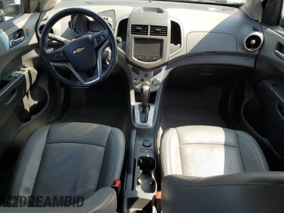 2014 Chevrolet Sonic LTZ with VIN 1G1JE6SB7E4131264, listed as a Copart auction lot 70743035 with 130,070 mi miles and Salvage title. Bid and sale history available at DreamBid. Image 8.